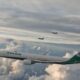 ROCAF F-16 jets escort EVA Air flight with Olympic athletes